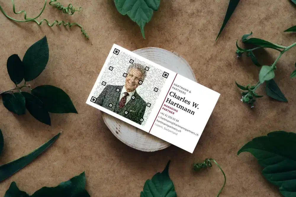 Picture QR code business card with a photo on a wooden surface