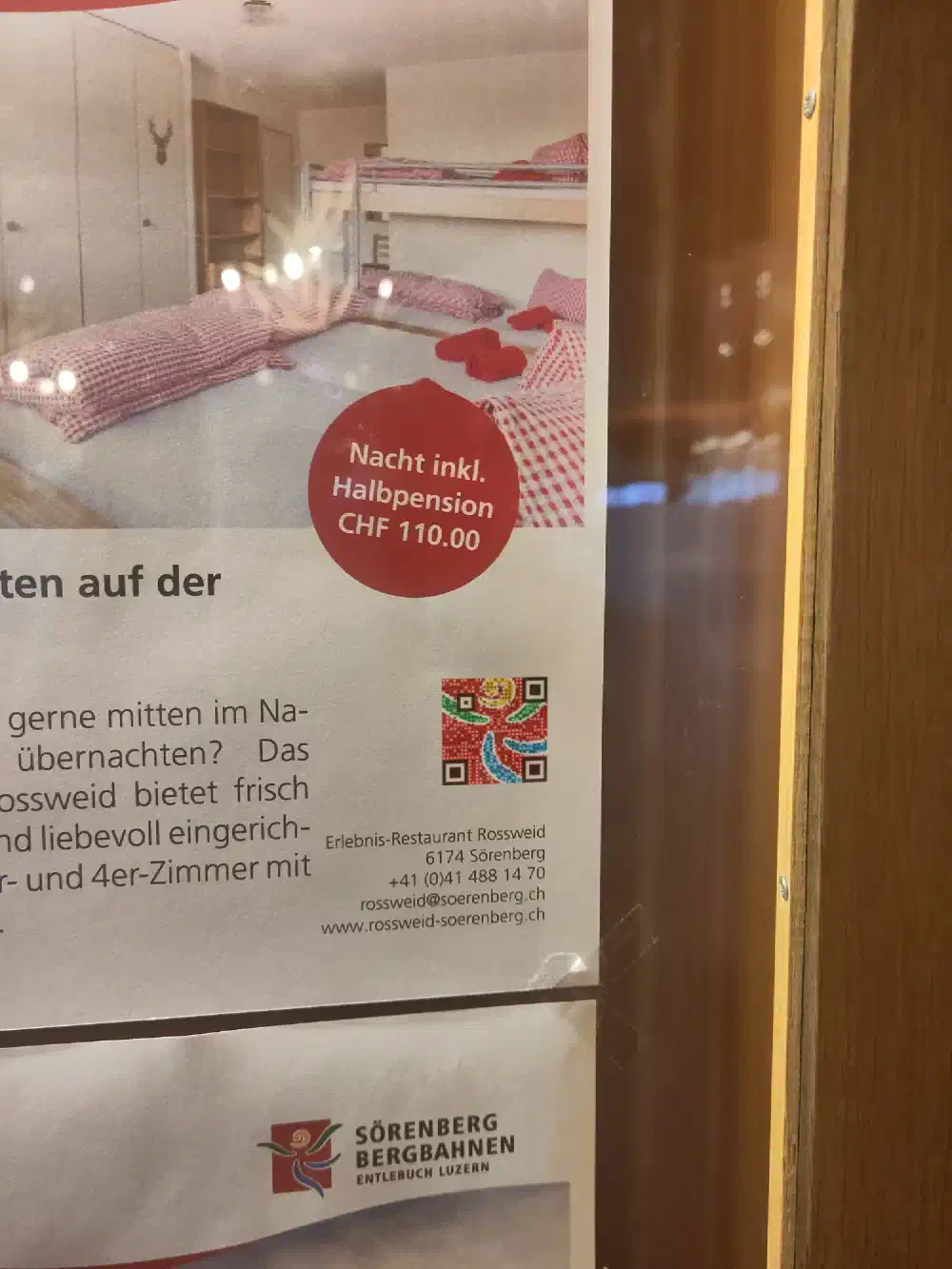 Picture QR code with a logo on a hotel advertisement